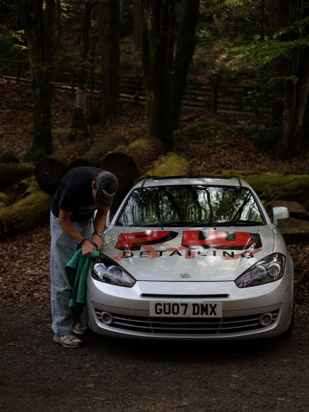 Levi working on a car